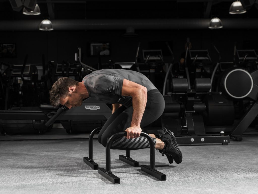 How to perform Tuck Planche Push-ups on Medium Parallettes – Auster